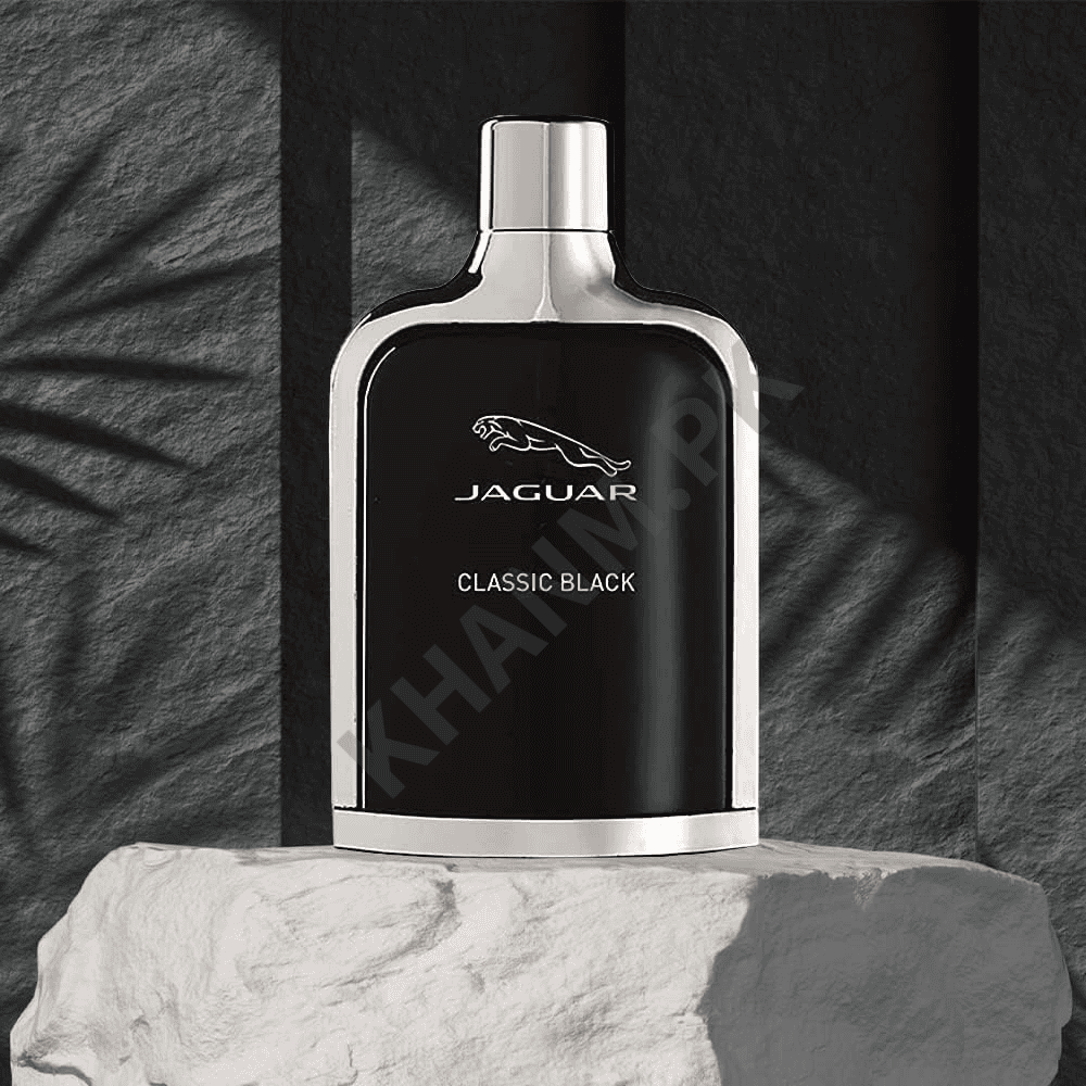 Jaguar Classic Black perfume bottle on a textured surface with a dark background