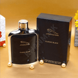 Jaguar Classic Black perfume bottle and packaging on a gold surface