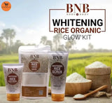 BNB Whitening Rice Organic Glow Kit with rice products and a scenic background