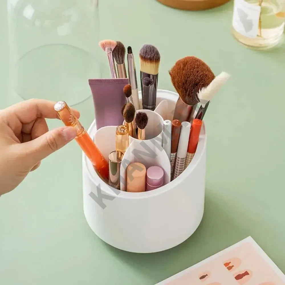 White makeup organizer with various brushes and containers on a light green surface.